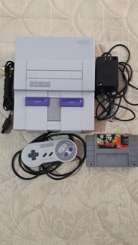 Super Nintendo branquinho com controle e fonte originais cabo AV e jogo