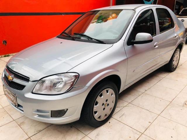 Prisma 2012 lt 1.4 flex completo, único dono !!! - Foto 7