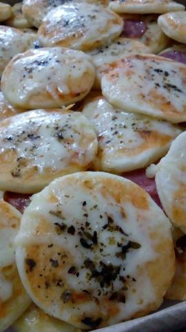 Mini pizzas : 60,00 o cento