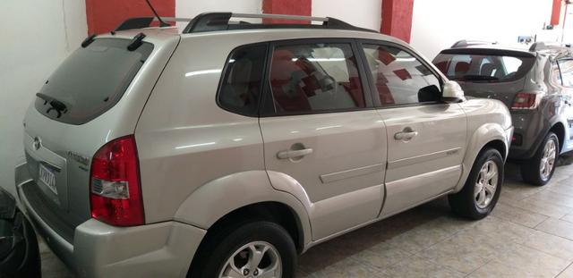 Hyndai Tucson Top autom. noiva troco e financio aceito carro ou moto maior ou menor valor - Foto 3