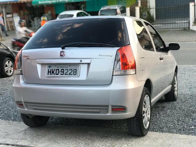 Palio com Ar condicionado e Direção hidráulica - Foto 6