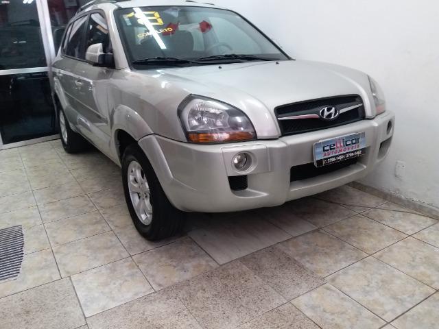 Hyndai Tucson Top autom. noiva troco e financio aceito carro ou moto maior ou menor valor - Foto 11