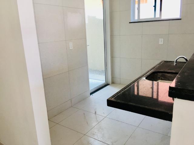 Documentação Inclusa: 2 quartos, 2 wcs, garagem, sala, coz americana, quintal, área serviç - Foto 10