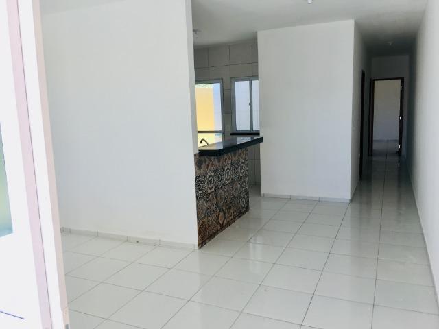 Linda casa com documentação gratis : 2 quartos , 2 banheiros , 2 vagas de garagem - Foto 4