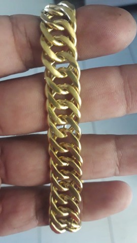Vendo pulseira masculina em prata banhado a ouro peça nova muito top 46 gramas