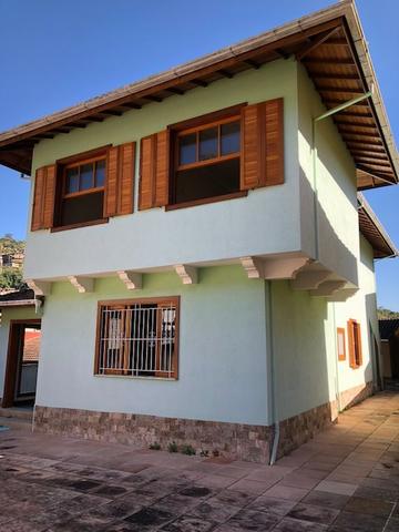 Excelente casa no centro com 4 quartos, uma suite e garagem