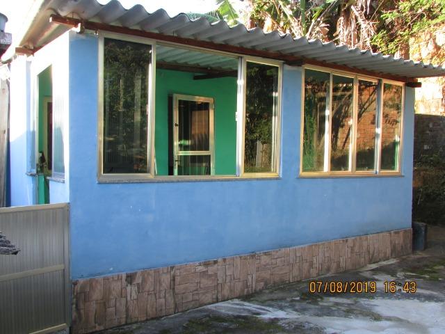 Casa com quintal, tudo murado, Bairro tranquilo, asfalto, condução, comércio!