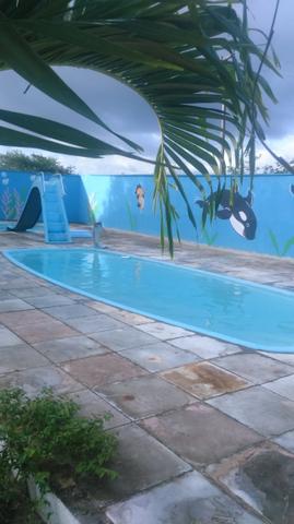 Granja em tapara com casa, mais 6 dormitórios, área lazer com piscina