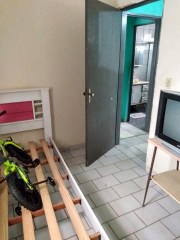 Vende-se com sobrado no fundo R$180.000