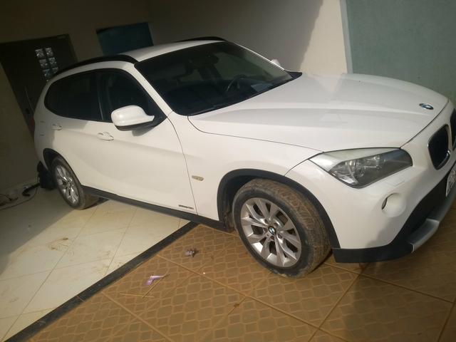 Vendo ou troco em carro de menor valor BMW X1 sdrive 2.0 18i 4x2 2011 completa - Foto 3