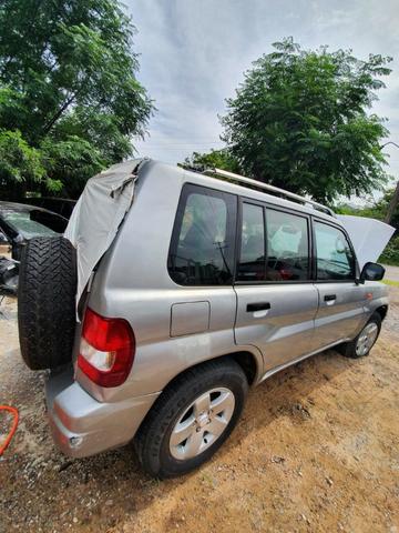 Em peças Mitsubishi pajero io 1999 sucata - Foto 4