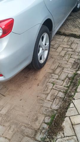 Toyota corolla XEI 14/14 - Foto 18