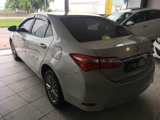 Toyota Corolla Sedan Xei - Foto 4