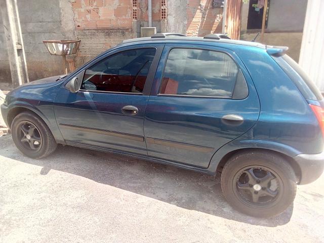 Celta -2003 vhc 4 portas banco de couro aro 14 vendo 10 mil ou troco por carro sedan
