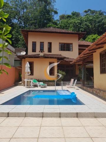 Casa com 4 dormitórios à venda, 500 m² por R$ 1.580.000 - Quarteirão Brasileiro - Petrópol