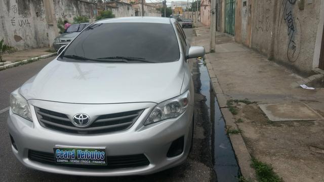 Toyota Corolla 1.8 GLI 2012 AUT extra! banco de couro, aceito motos e carros menor valor