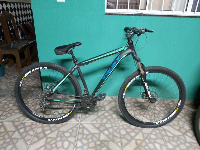 Bike mtb aro 29 trust freios a disco - Foto 2