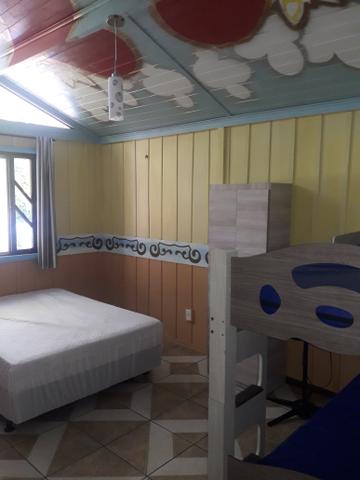 Casa com Piscina Confortável em Ótima Localização - Foto 6