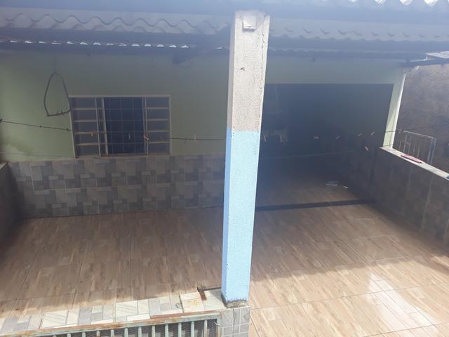 Vendo lote com casa nos fundos e construção na frente
