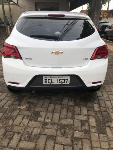 Vendo Onix em ótimo estado. Tudo pago. - Foto 3