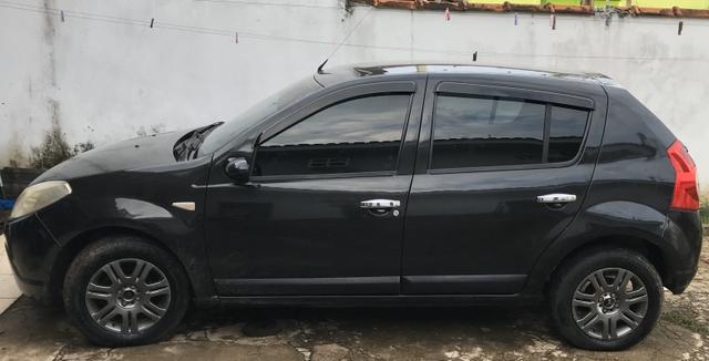 Vendo ou troco Sandero 1.6 ano 2008/2009 completo