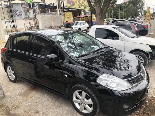 Nissan Tiida impecável