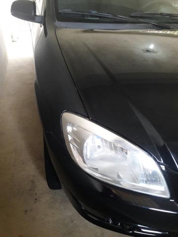 Vendo um celta Preto cegundo dono novinho bem conservado quilometragem 124 - Foto 5