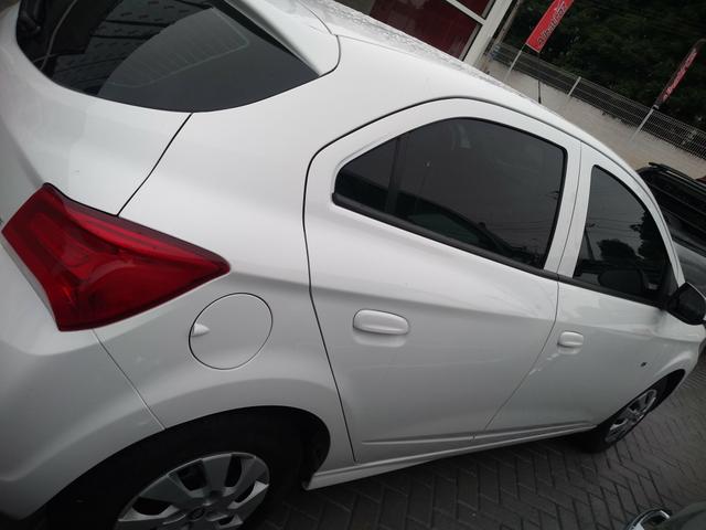 Onix LT completo abaixo tabela pneus okm air bag abs revisado garantia - Foto 16