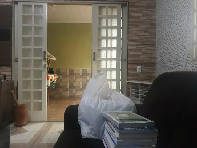Vendo lote com casa nos fundos e construção na frente - Foto 9