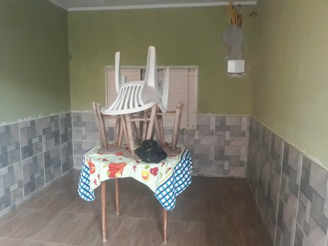 Vendo lote com casa nos fundos e construção na frente - Foto 7