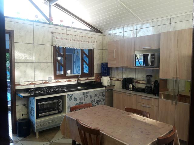 Casa com Piscina Confortável em Ótima Localização - Foto 10