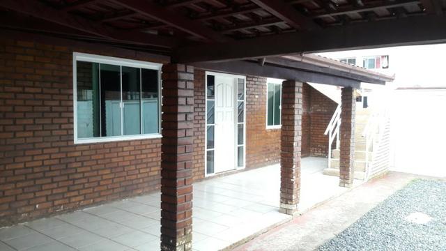 Locação anual Aparamento térreo 02 dormitórios com 01 vaga de estacionamento