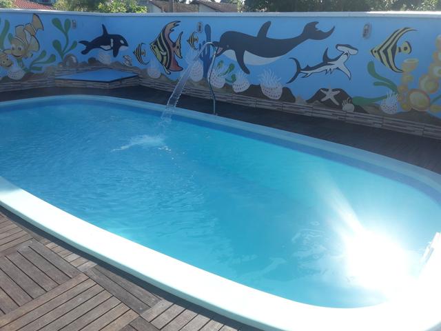 Casa com Piscina Confortável em Ótima Localização
