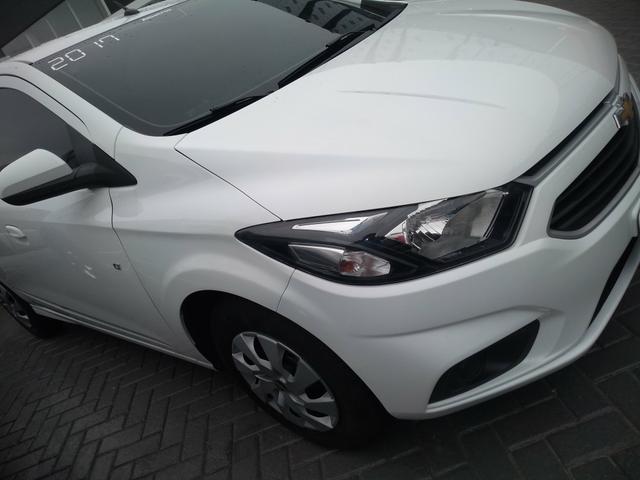 Onix LT completo abaixo tabela pneus okm air bag abs revisado garantia - Foto 14