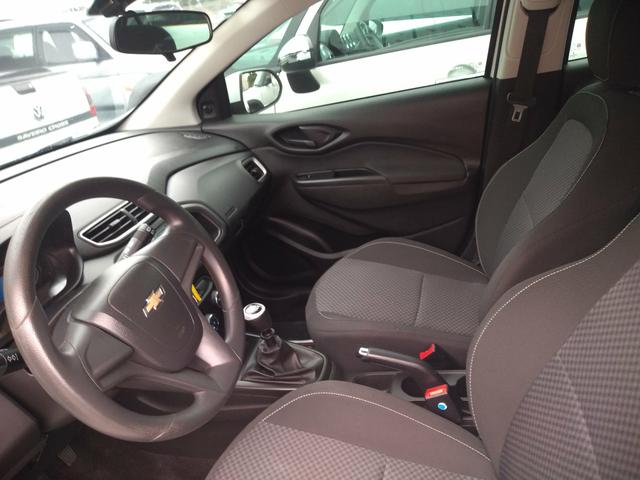 Onix LT completo abaixo tabela pneus okm air bag abs revisado garantia - Foto 15