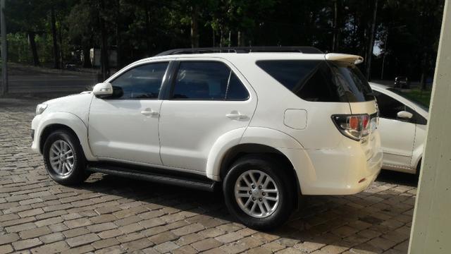 Toyota hilux sw4 srv 4x4 ano 2013 07 lugares aut valor: 130.000,00 - Foto 11