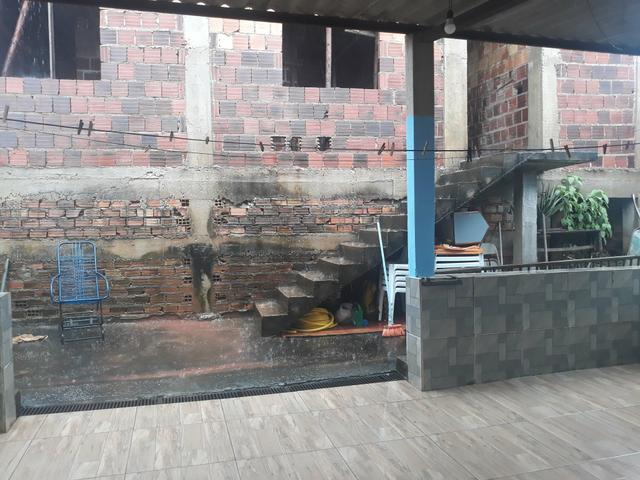 Vendo lote com casa nos fundos e construção na frente - Foto 11