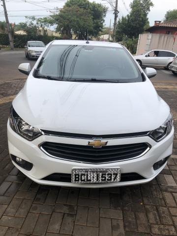 Vendo Onix em ótimo estado. Tudo pago. - Foto 2