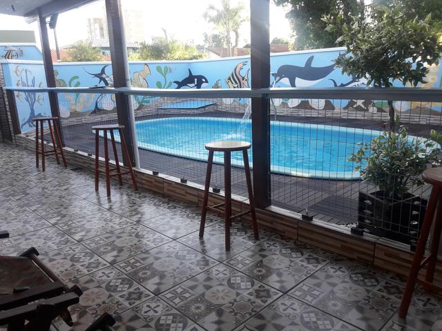 Casa com Piscina Confortável em Ótima Localização - Foto 20