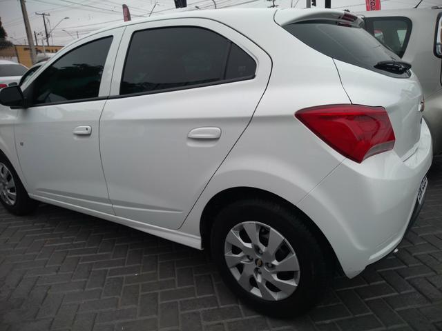 Onix LT completo abaixo tabela pneus okm air bag abs revisado garantia - Foto 11