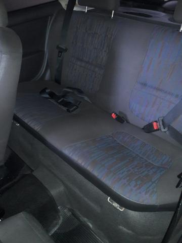 Vendo um celta Preto cegundo dono novinho bem conservado quilometragem 124 - Foto 12