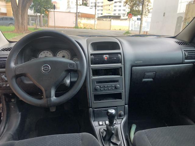 Astra Sedan 2010 - Foto 10