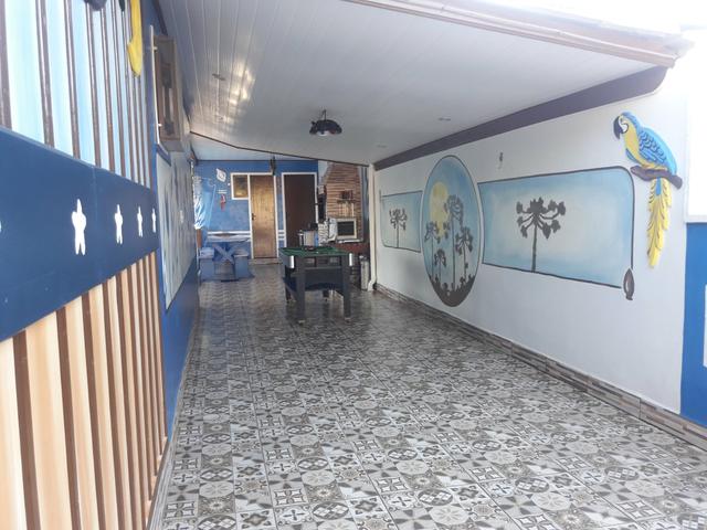 Casa com Piscina Confortável em Ótima Localização - Foto 11