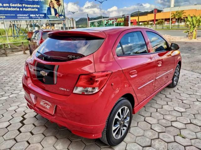 Chevrolet Onix 1.0 LT 2014 SERIE 24 HORAS - Foto 5