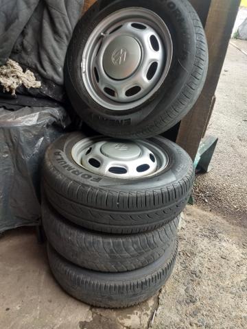 Rodas de cl com calotas novas nem usei - Foto 5