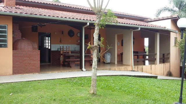 No Caputera - Chácara 2040 m² - toda murada- ótima casa - IPTU em dia - Foto 4