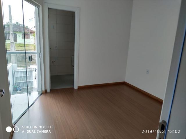 Sobrado geminado com 107 m² no Bairro Iririu - Foto 8