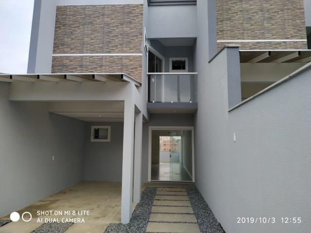 Sobrado geminado com 107 m² no Bairro Iririu - Foto 2