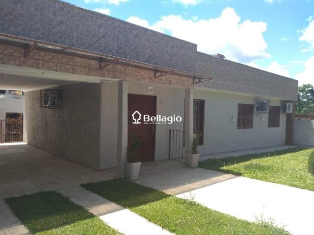 Casa 3 dormitórios, 1 suíte, 2 vagas de garagem** piscina