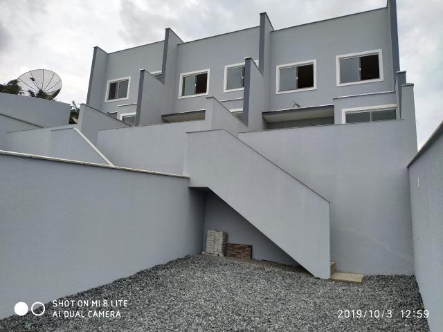 Sobrado geminado com 107 m² no Bairro Iririu - Foto 13